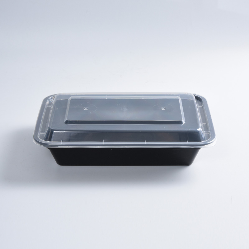Vierkante lunchbox met zwarte achtergrond